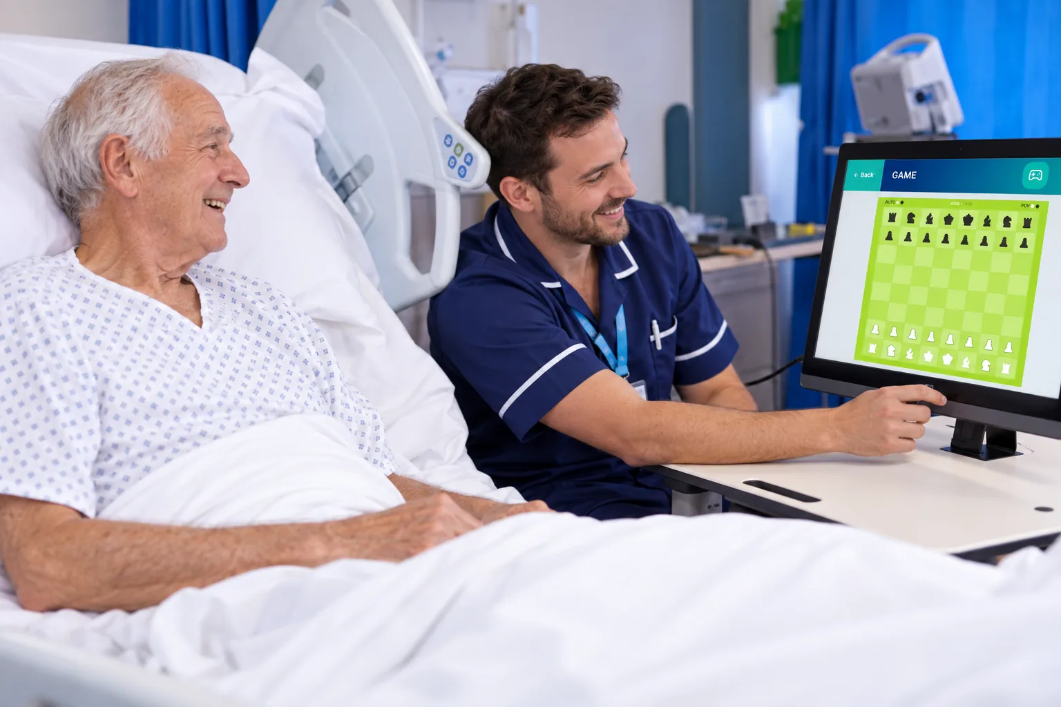 A patient and nurse sharing a game on TESS